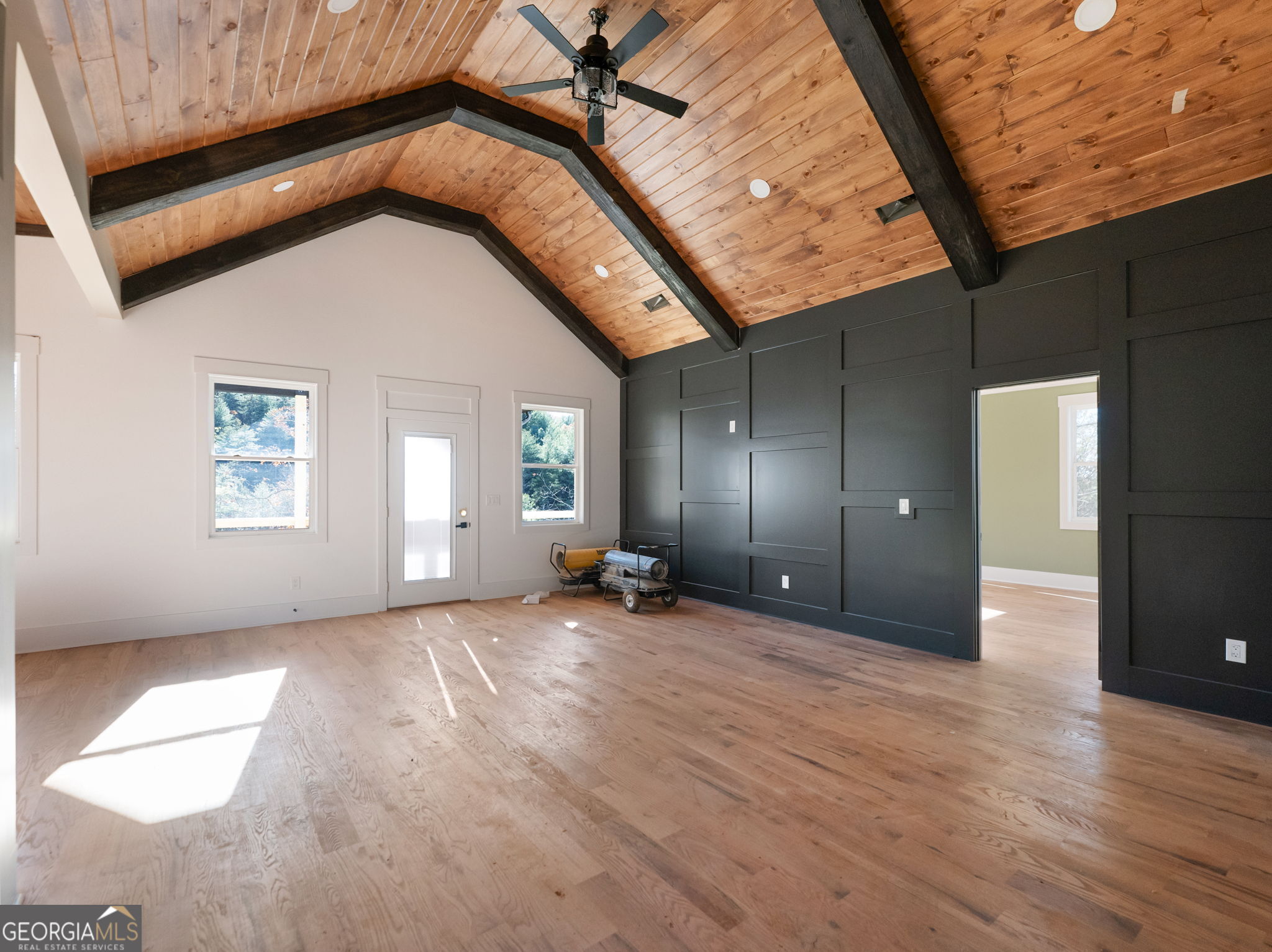 150 Alte Bruecke Strasse Helen, GA 30545 - Photo 22 of 43 an empty room with windows and fireplace