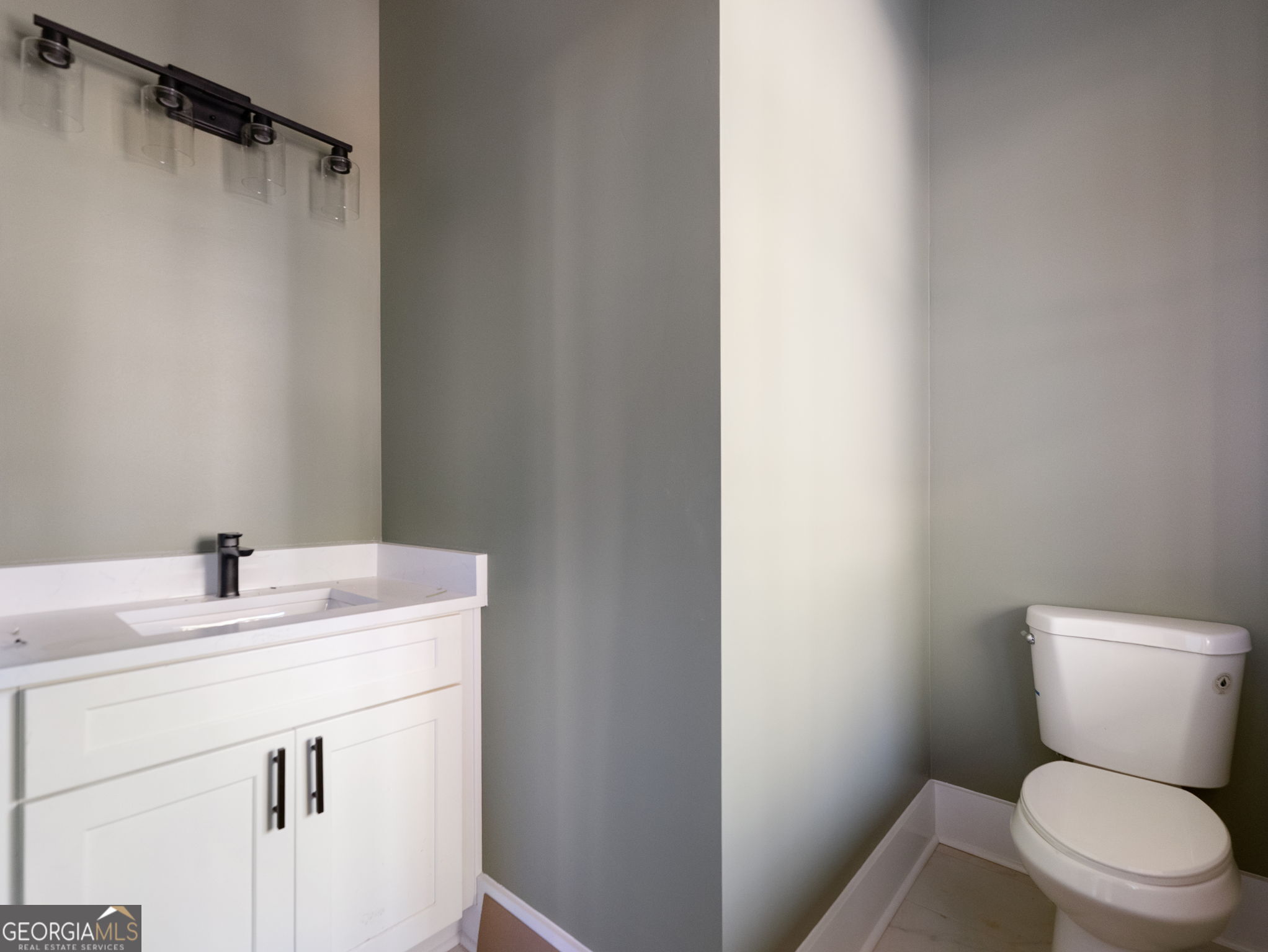 150 Alte Bruecke Strasse Helen, GA 30545 - Photo 3 of 43 a bathroom with a sink a toilet and a mirror