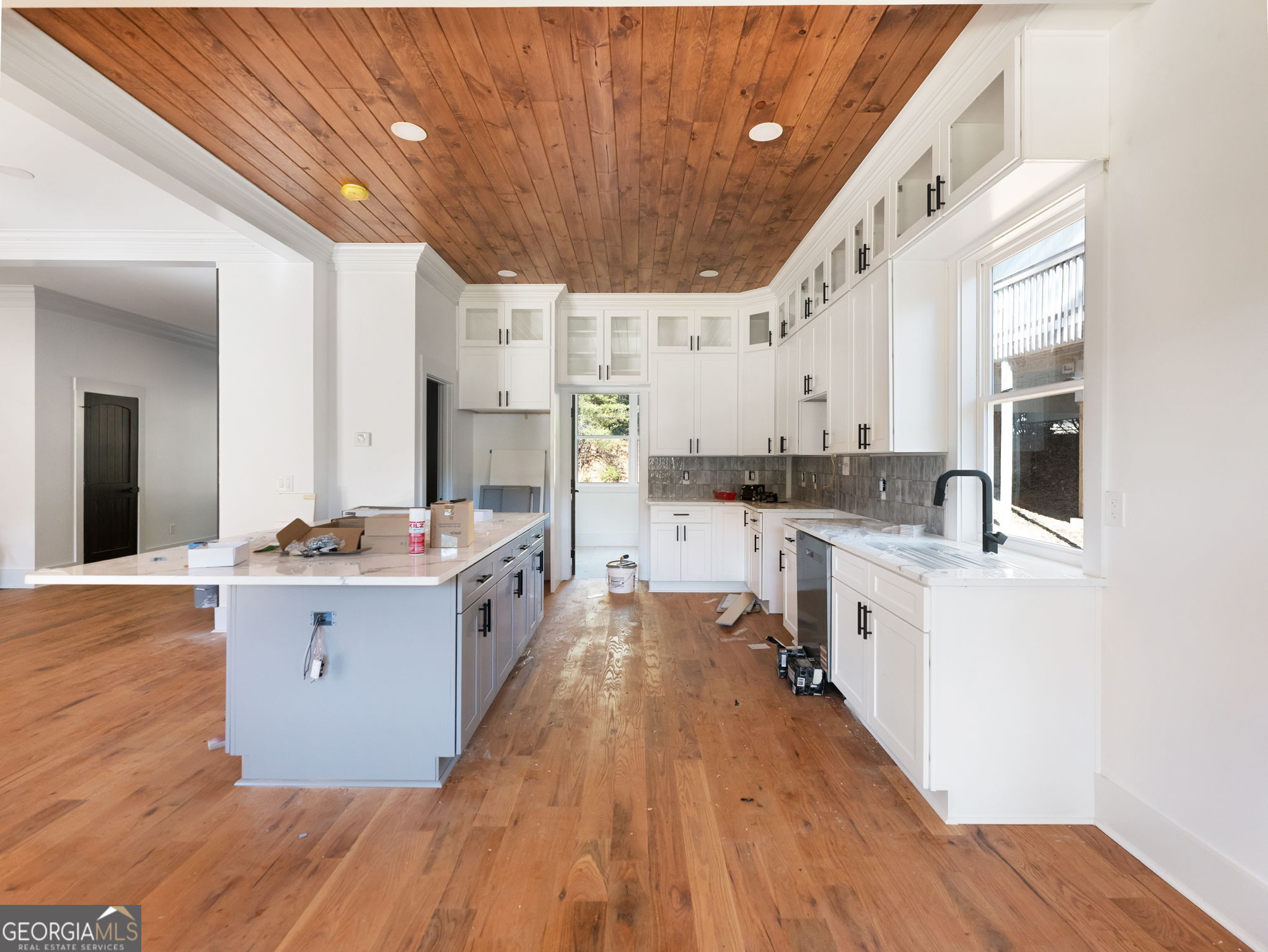 150 Alte Bruecke Strasse Helen, GA 30545 - Photo 9 of 43 a large kitchen with stainless steel appliances a lot of counter space and a wooden floors