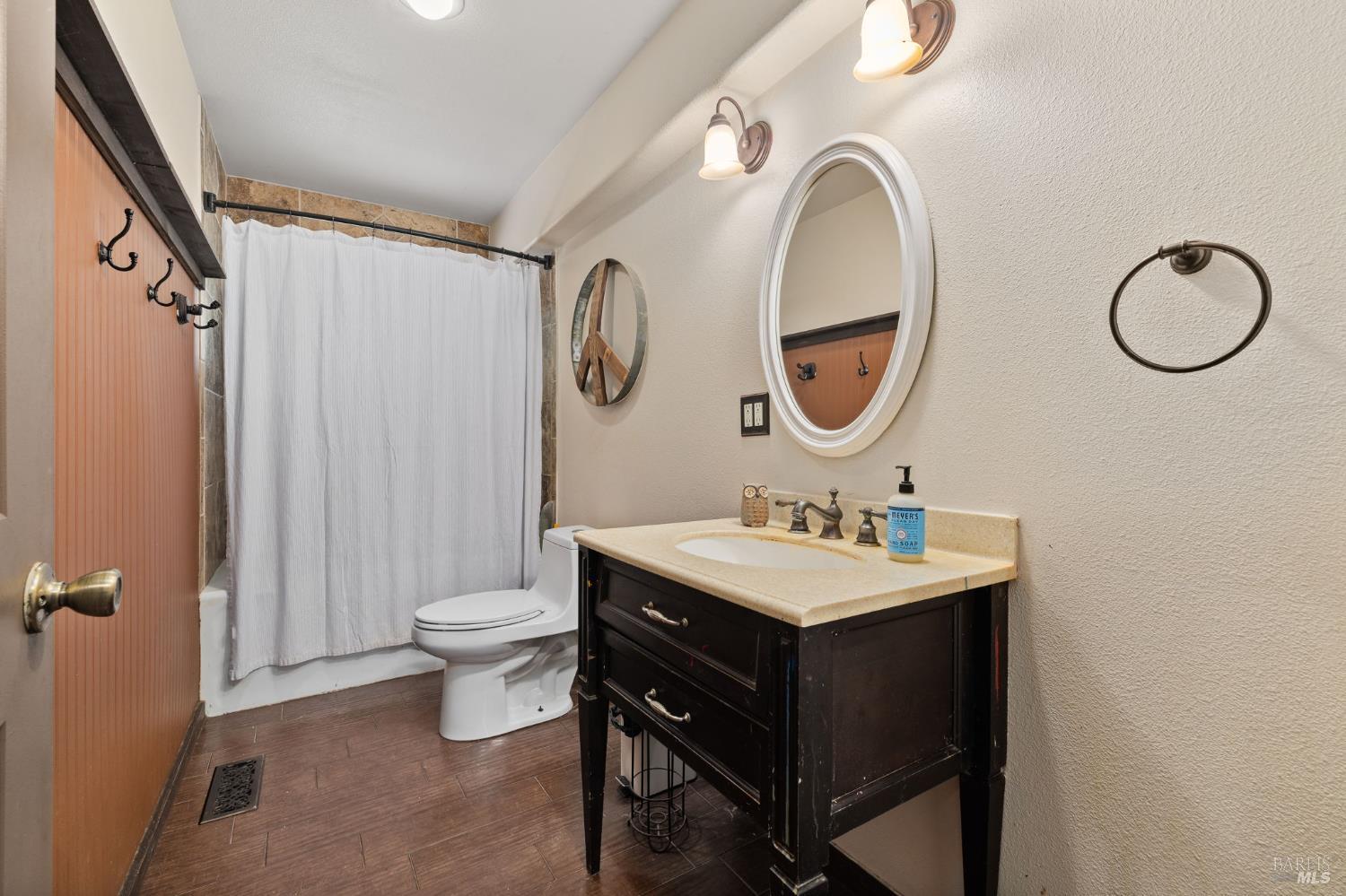 9935 Occidental Road Sebastopol, CA 95472 - Photo 17 of 59 Full bathroom on the main level of the home