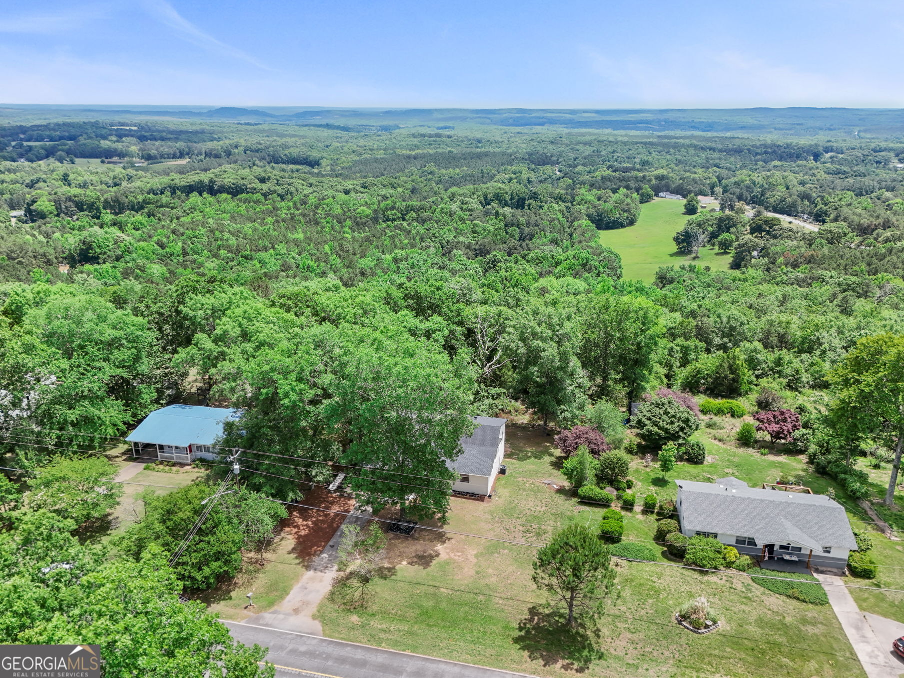 7060 Scenic Heights Road Manchester, GA 31816 - Photo 49 of 52 an aerial view of a house with a yard