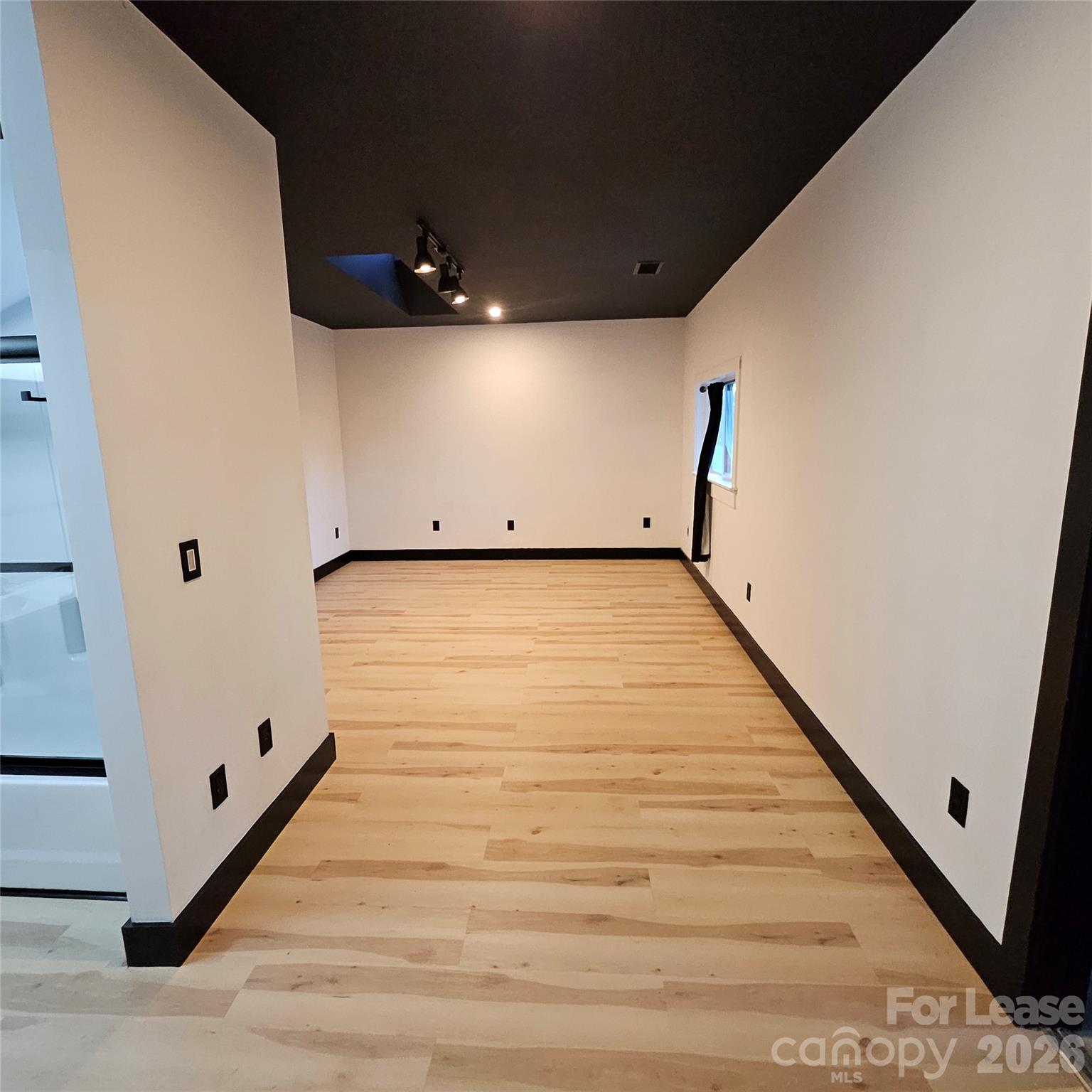 1002 Crawford Road, Unit 6 Rock Hill, SC 29730 - Photo 7 of 17 a view of a hallway with wooden floor