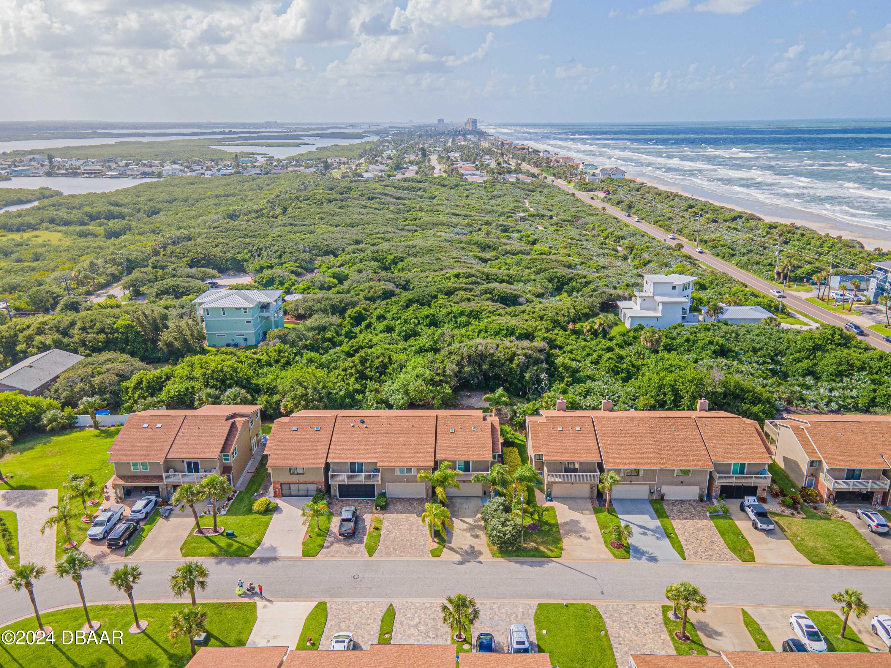 42 Jana Drive Ponce Inlet, FL 32127 - Photo 34 of 34 an aerial view of residential houses with outdoor space and swimming pool