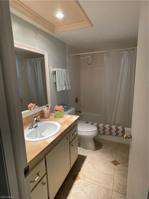 541 Teryl Road, Unit 1 Naples, FL 34112 - Photo 24 of 33 a bathroom with a sink and a mirror