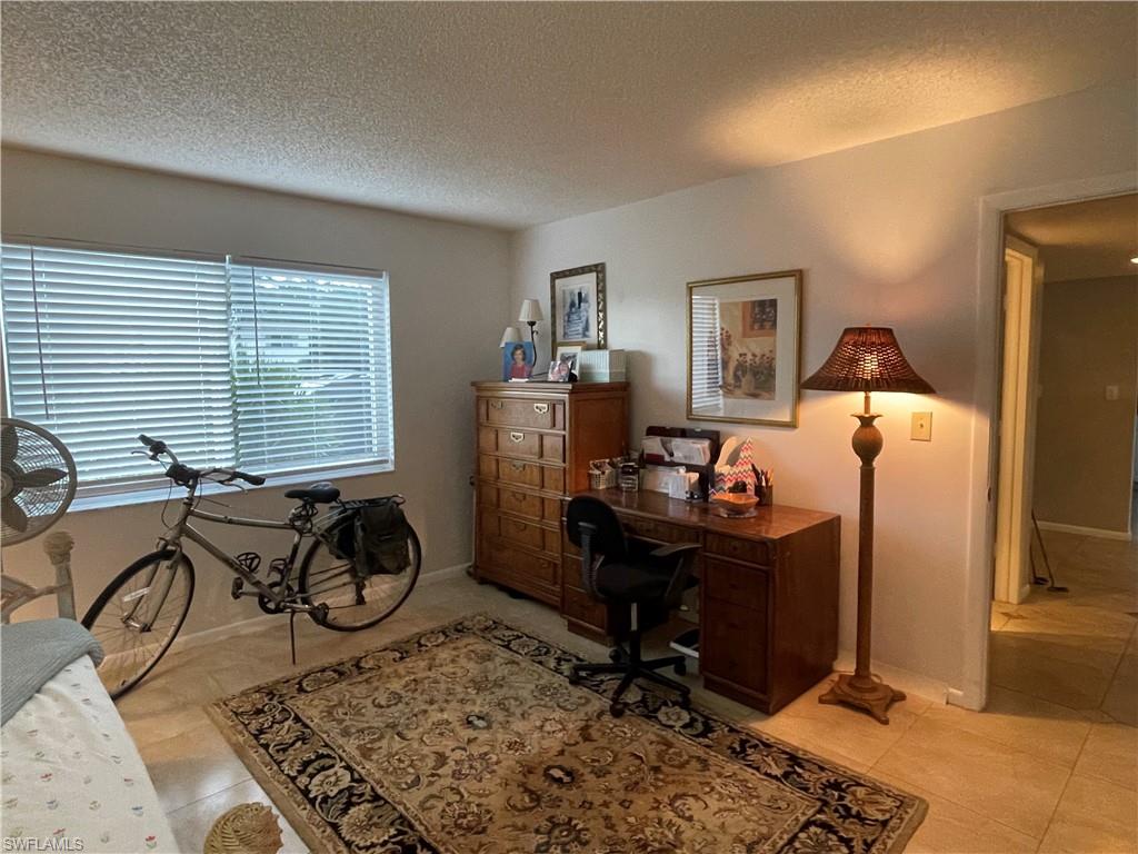 541 Teryl Road, Unit 1 Naples, FL 34112 - Photo 27 of 33 a view of a workspace with furniture and a window