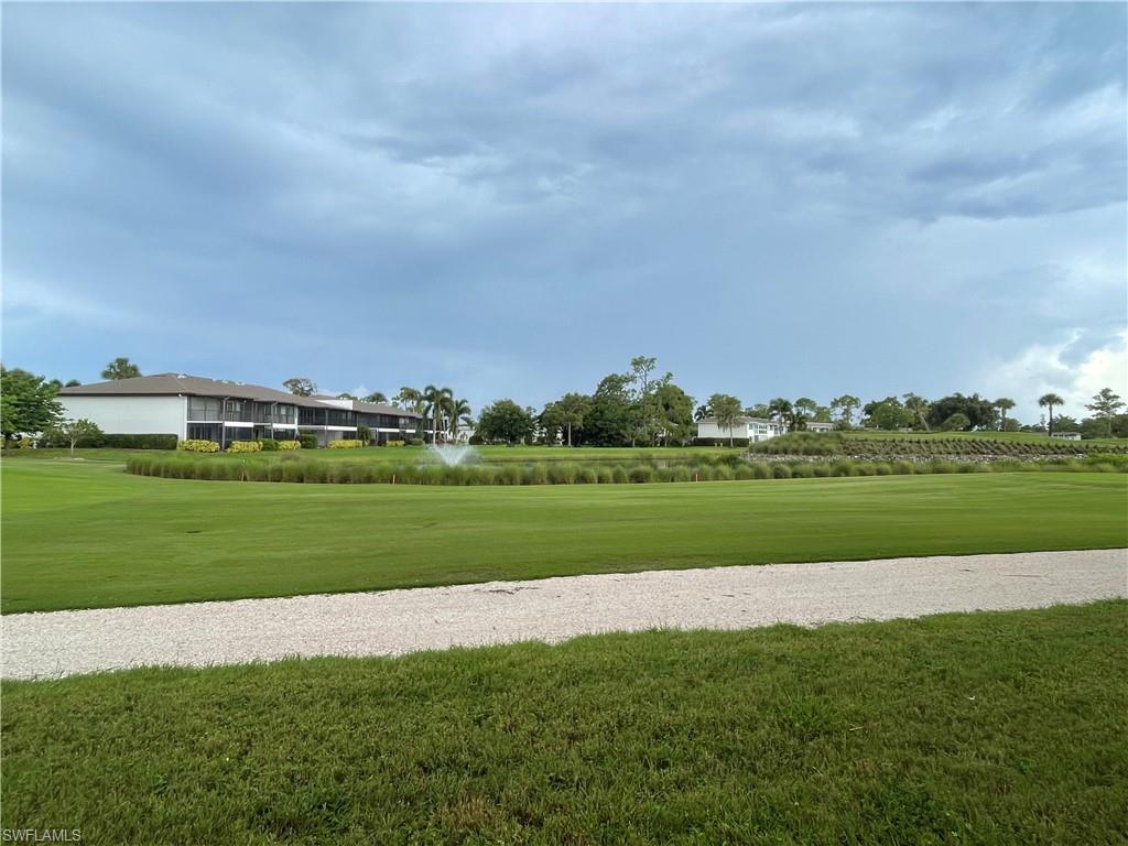 541 Teryl Road, Unit 1 Naples, FL 34112 - Photo 28 of 33 a view of a golf course with a field