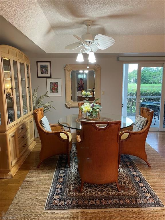 541 Teryl Road, Unit 1 Naples, FL 34112 - Photo 6 of 33 a living room with furniture a window and a dining table