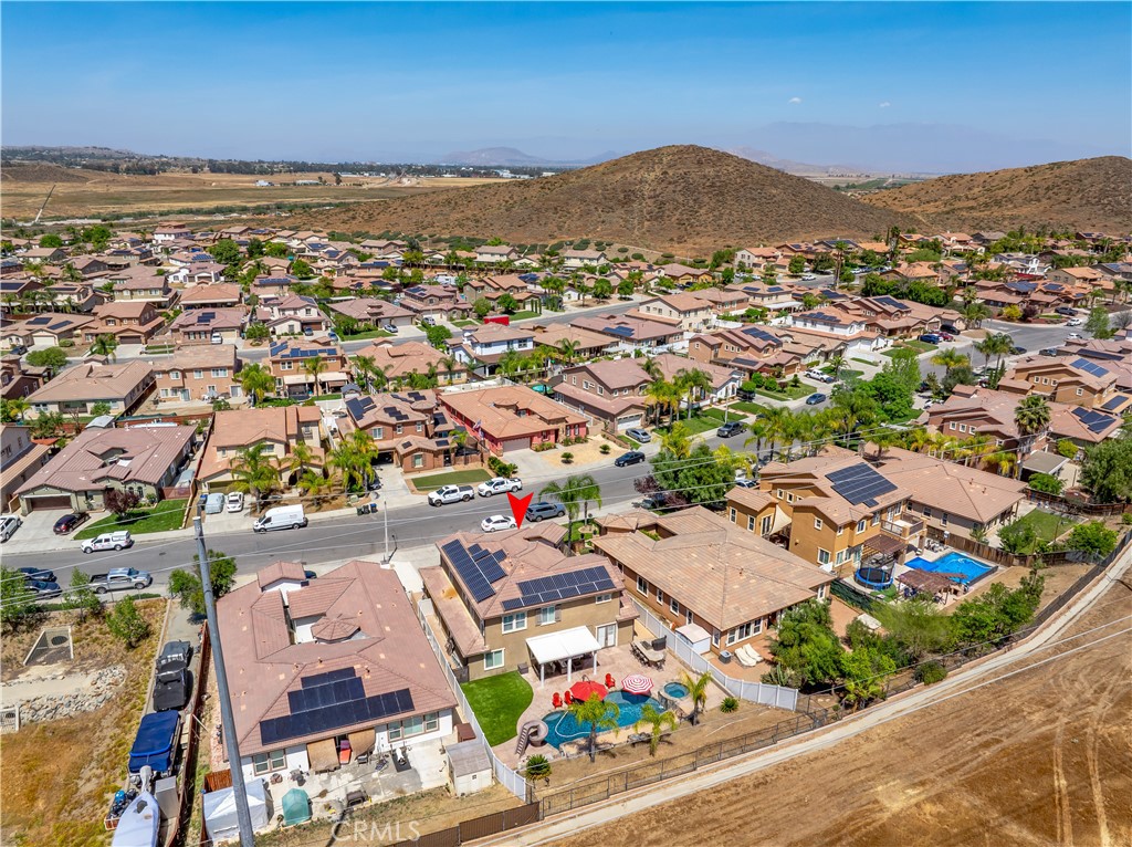 353 Caldera Street Perris, CA 92570 - Photo 50 of 53 an aerial view of residential houses with outdoor space