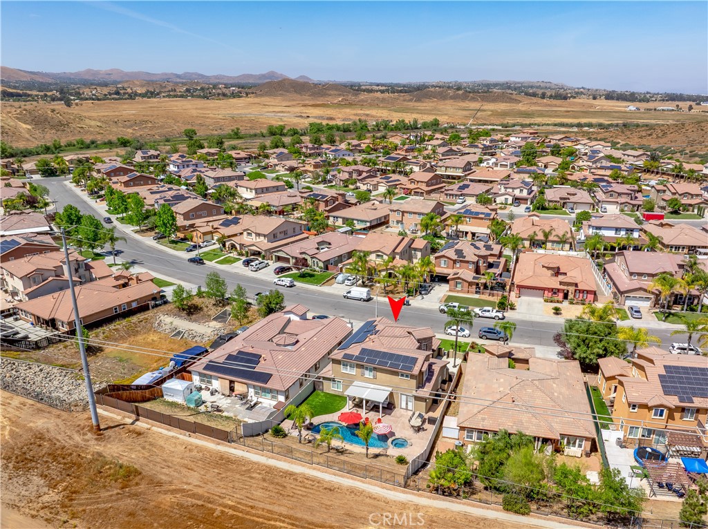 353 Caldera Street Perris, CA 92570 - Photo 52 of 53 an aerial view of residential building and lake
