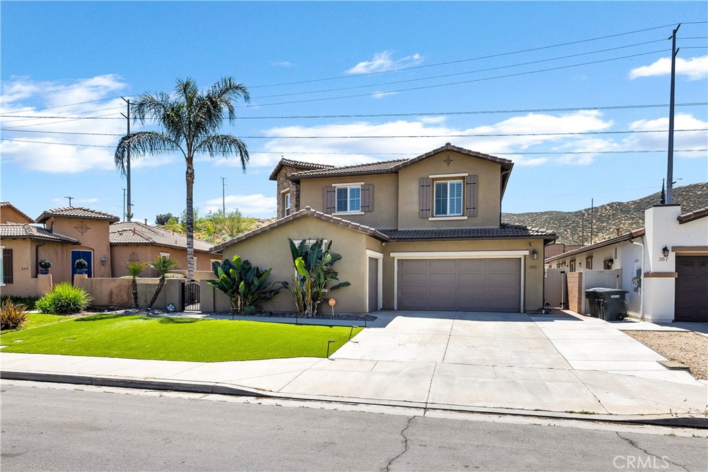353 Caldera Street Perris, CA 92570 - Photo 7 of 53 a house view with a garden space