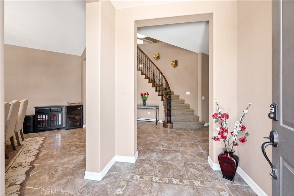353 Caldera Street Perris, CA 92570 - Photo 9 of 53 a view of entryway with wooden floor