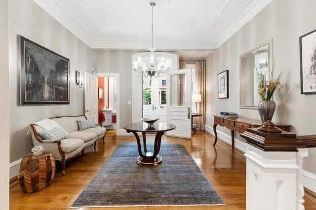 a living room with furniture and a table