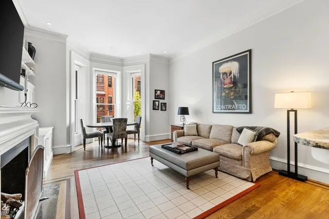 a kitchen with stainless steel appliances granite countertop a stove and cabinets