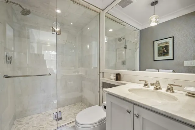 a bedroom with a bed and a table