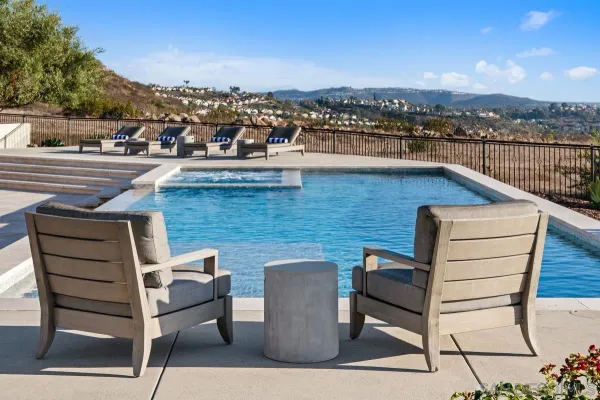 an aerial view of a house with a garden