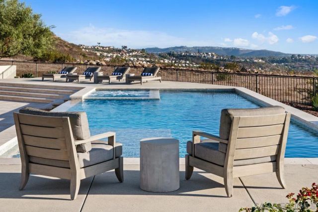 an aerial view of a house with a garden