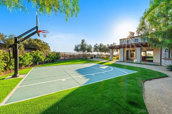 a view of a house with outdoor space and sitting area