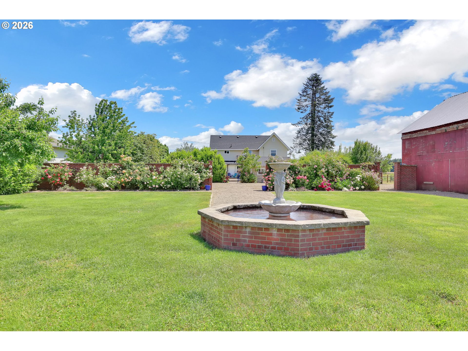90440 Goodman Road Junction City, OR 97448 - Photo 40 of 48 a view of a water fountain in front of the house