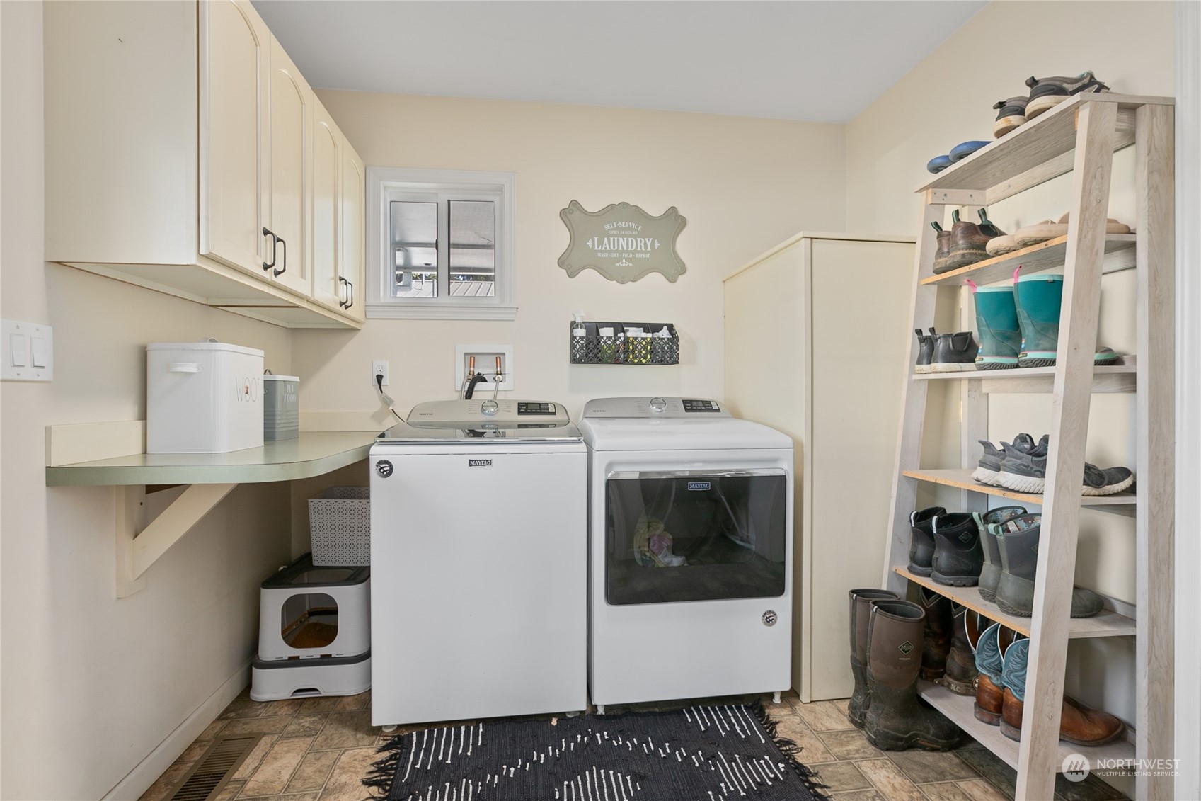 9699 Double Ditch Road Lynden, WA 98264 - Photo 15 of 40 a utility room with cabinets dryer and washer