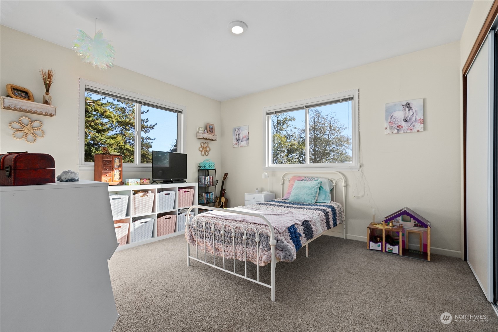 9699 Double Ditch Road Lynden, WA 98264 - Photo 26 of 40 a bedroom with a bed and a window