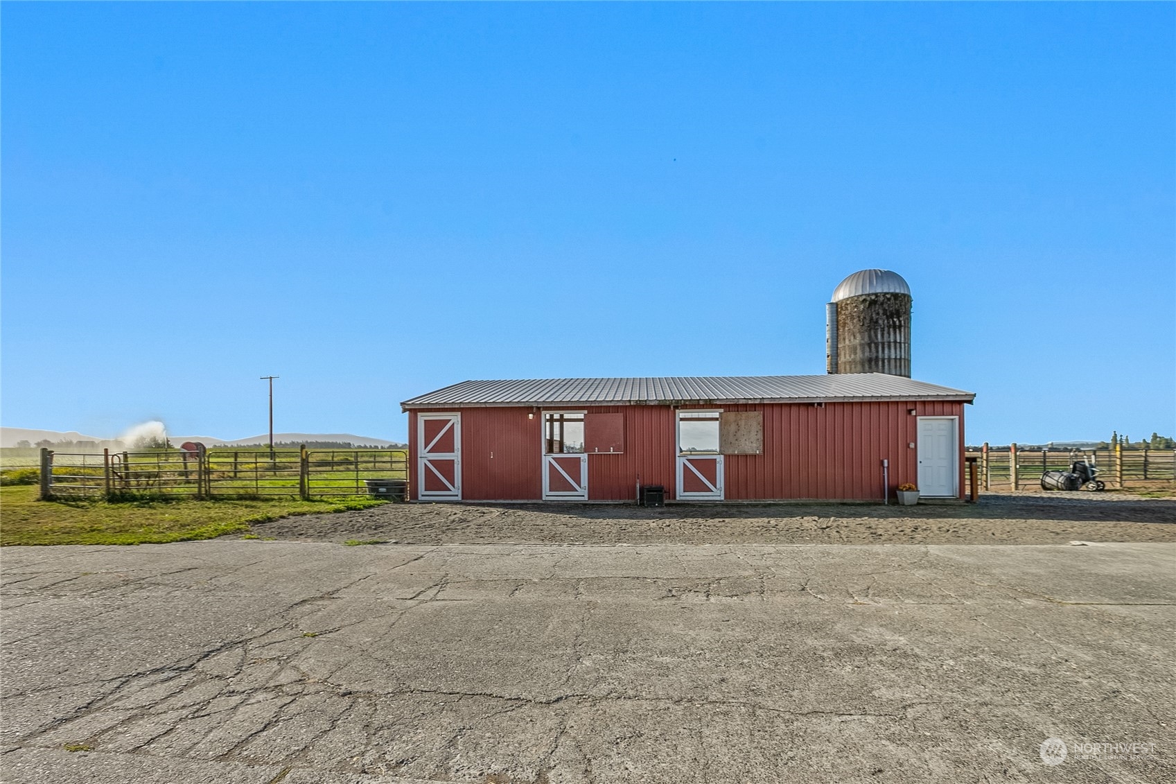 9699 Double Ditch Road Lynden, WA 98264 - Photo 36 of 40 a view of a house with a yard
