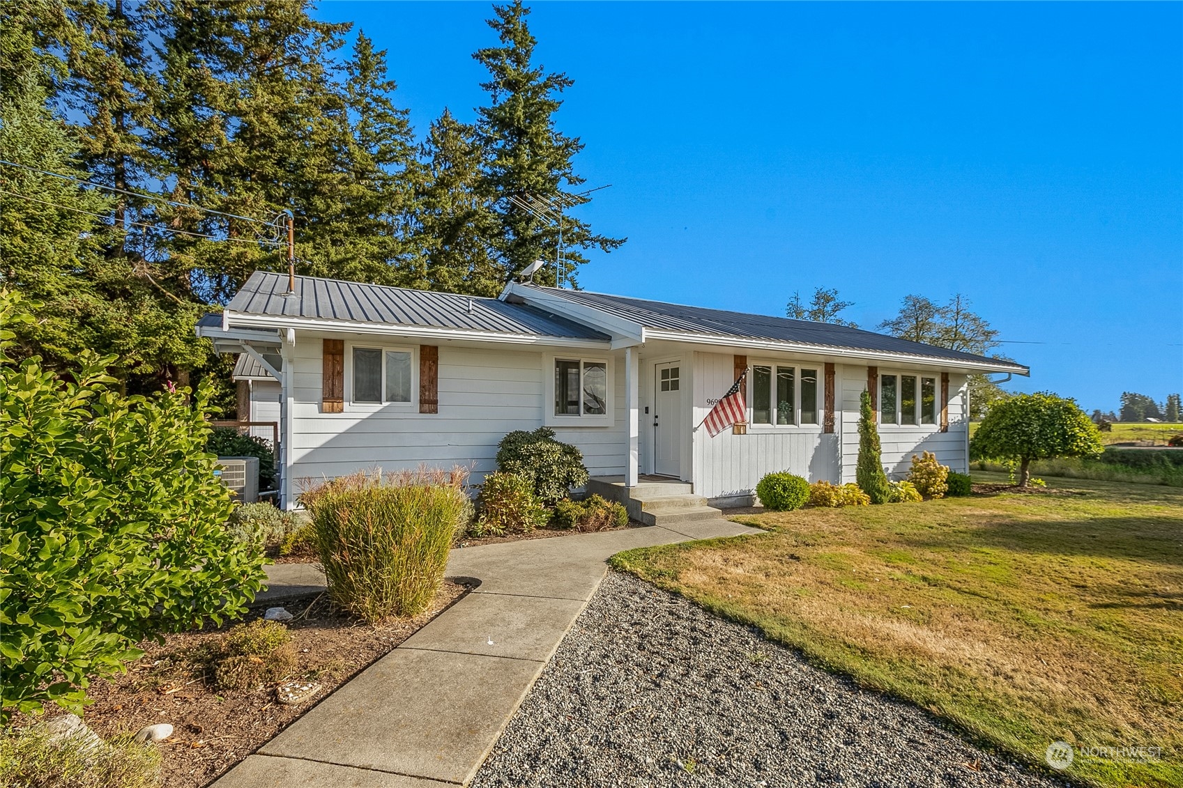 9699 Double Ditch Road Lynden, WA 98264 - Photo 4 of 40 a front view of a house with a porch