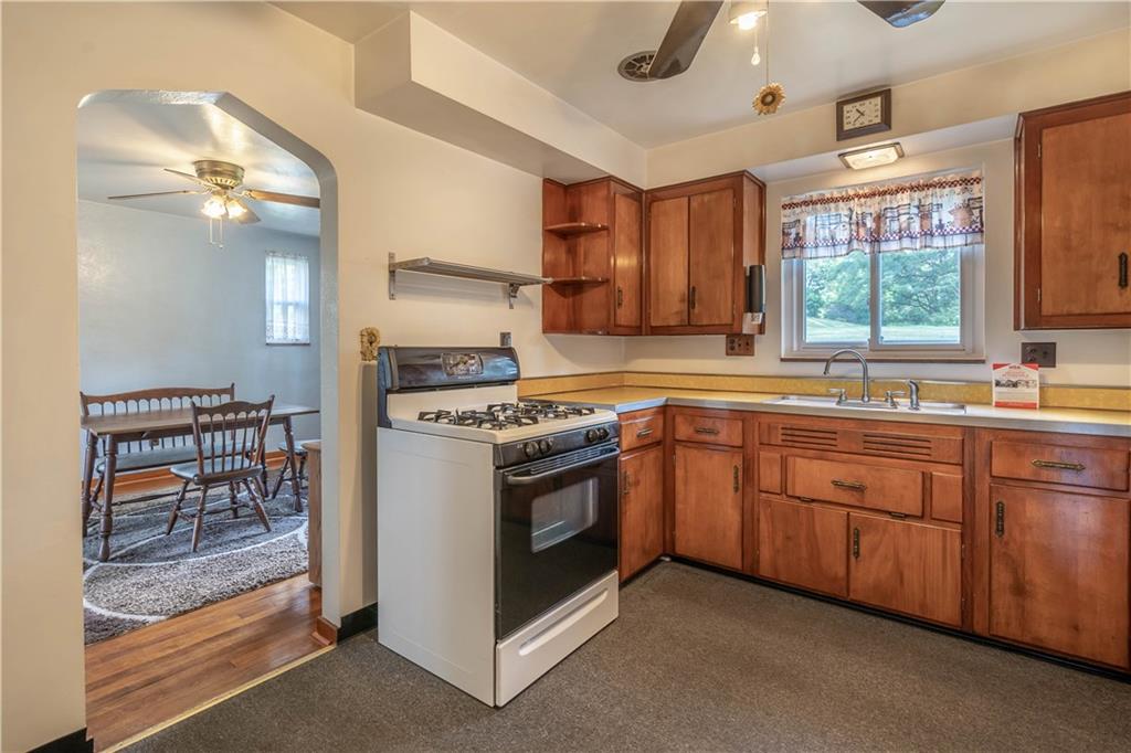 1465 Prospect Road Pittsburgh, PA 15227 - Photo 9 of 25 ANOTHER VIEW OF THE KITCHEN LOOKING BACK IN TO THE DINING ROOM