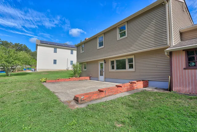 a front view of house with yard
