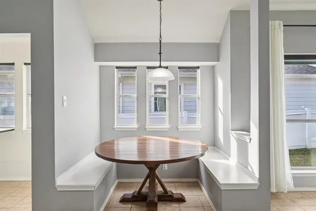 a view of a livingroom with furniture and window