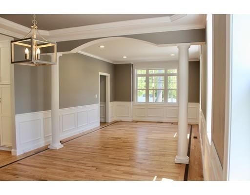 23 Manhattan Drive Burlington, MA 01803 - Photo 9 of 30 a view of an empty room with wooden floor and a window