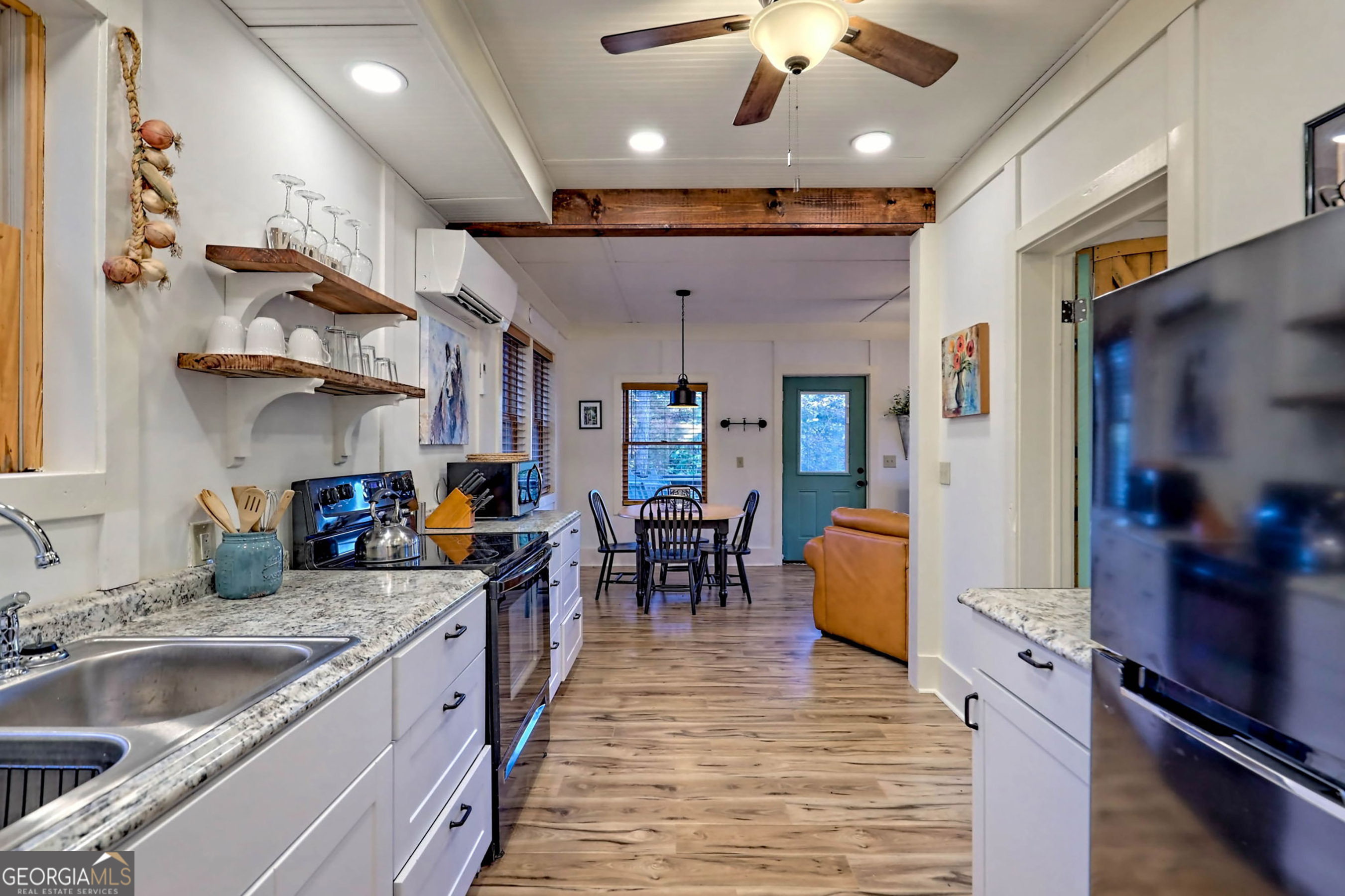 9406 Bridge Creek Road Tiger, GA 30576 - Photo 179 of 197 a kitchen with stainless steel appliances granite countertop lots of counter top space