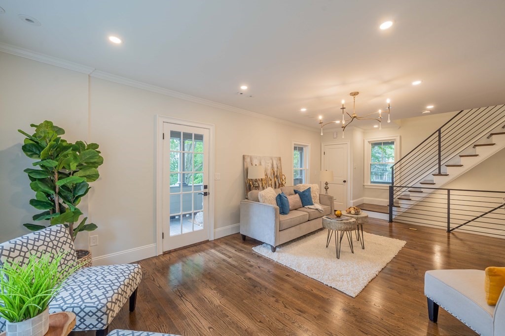 26 Locust Avenue Lexington, MA 02421 - Photo 2 of 42 a living room with furniture and a chandelier