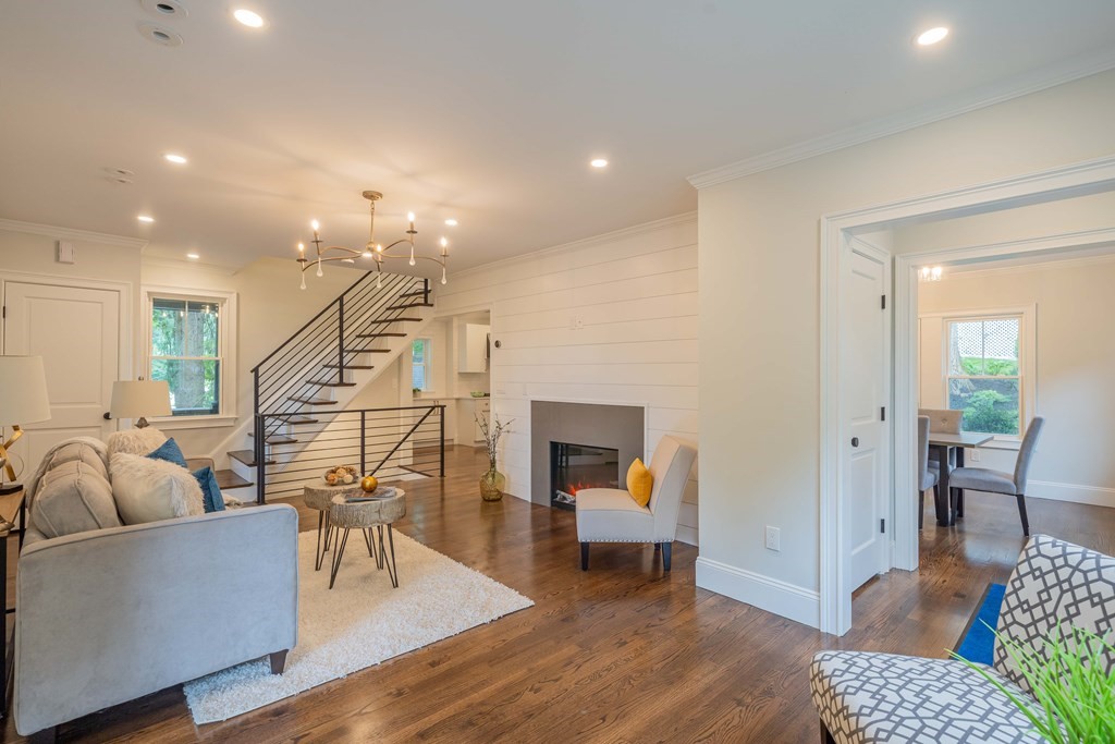 26 Locust Avenue Lexington, MA 02421 - Photo 3 of 42 a living room with furniture and wooden floor