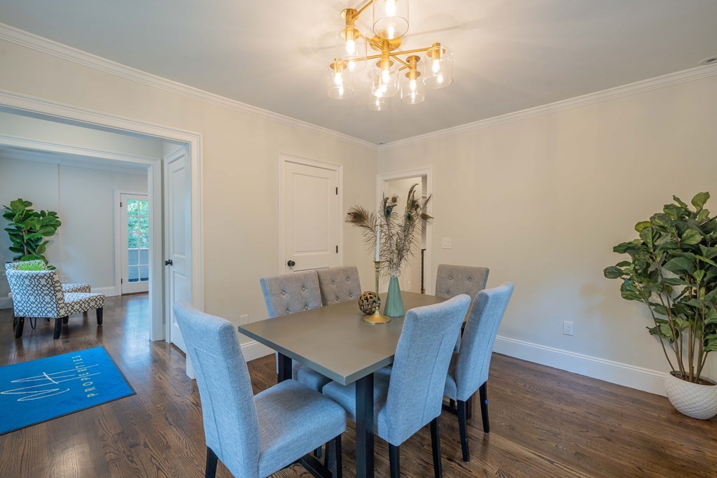 26 Locust Avenue Lexington, MA 02421 - Photo 10 of 42 a view of a dining room with furniture and wooden floor