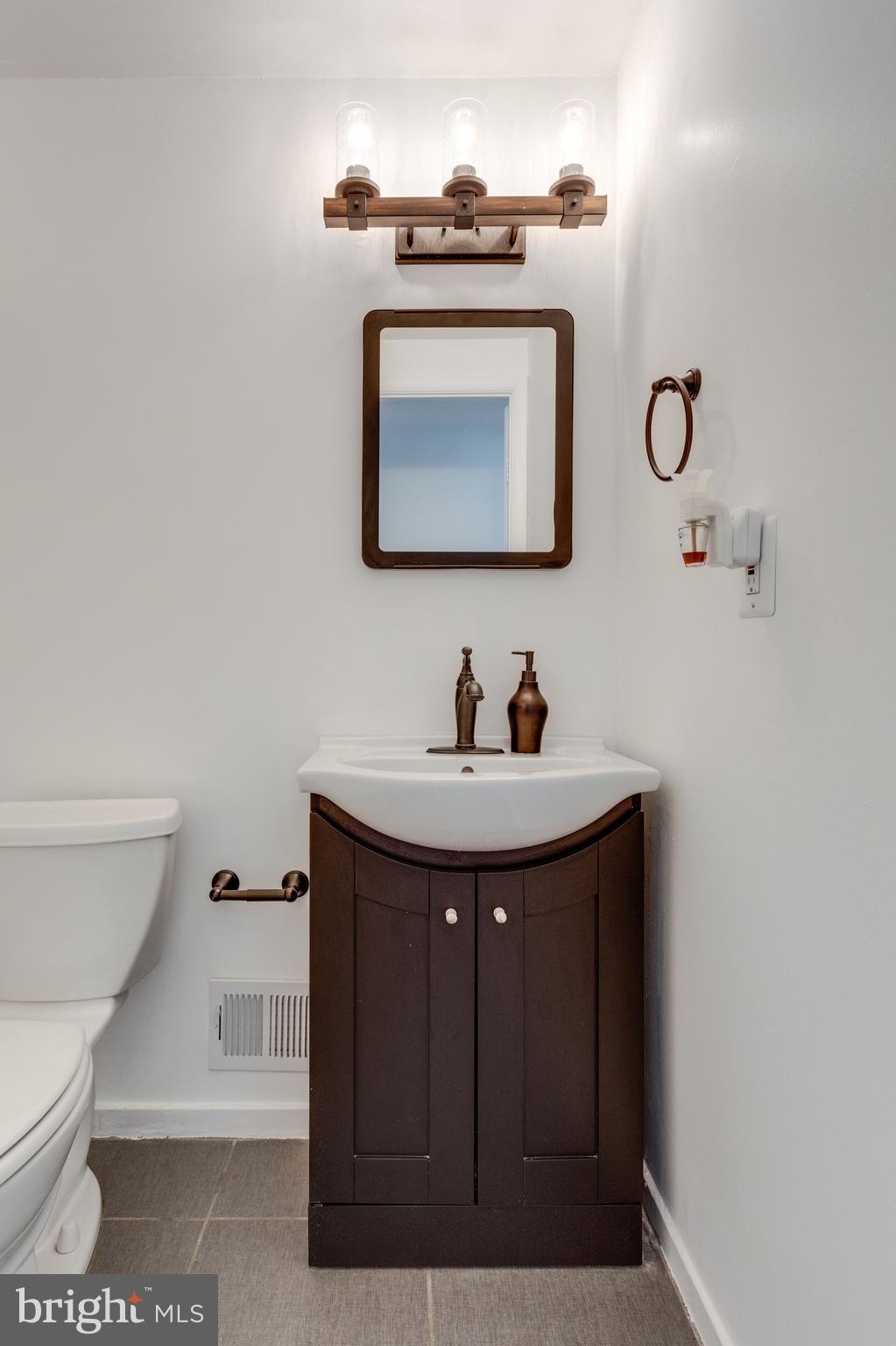 12204 Golden Sands Lane Reston, VA 20191 - Photo 12 of 48 renovared Powder room