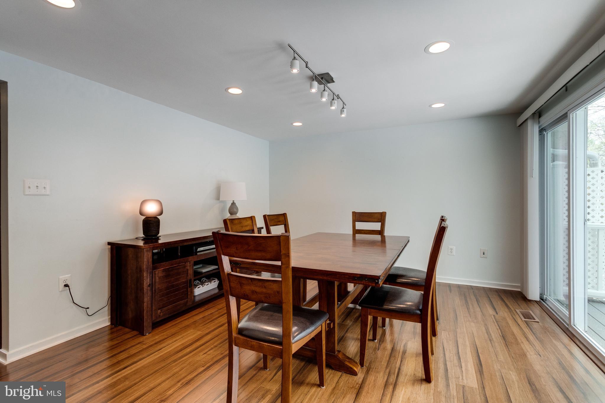 12204 Golden Sands Lane Reston, VA 20191 - Photo 13 of 48 Large Dining room opens to deck