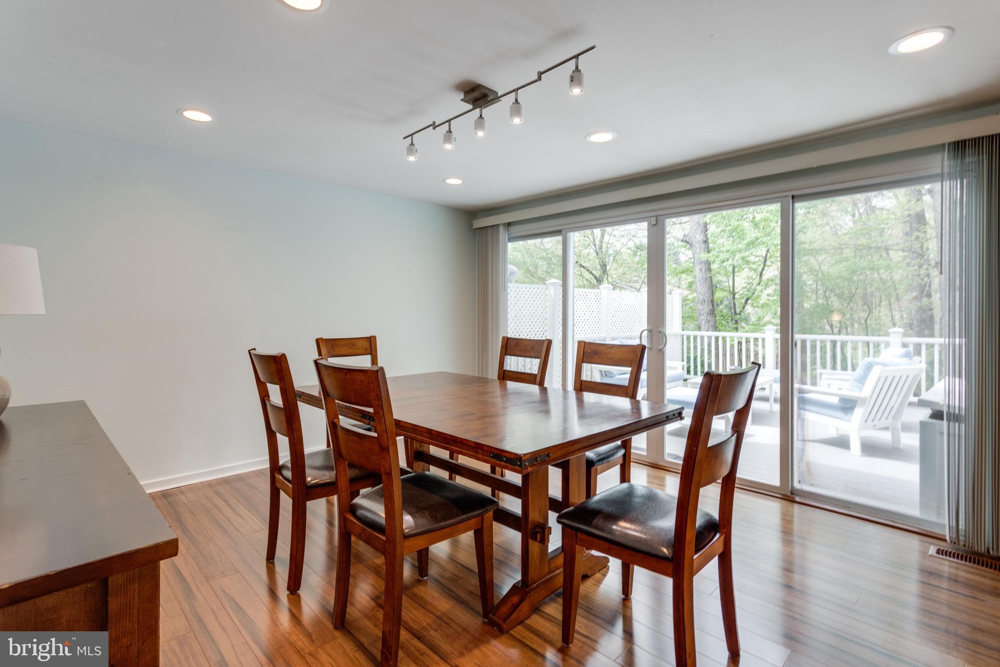 12204 Golden Sands Lane Reston, VA 20191 - Photo 14 of 48 Expanded wall to wall sliding doors