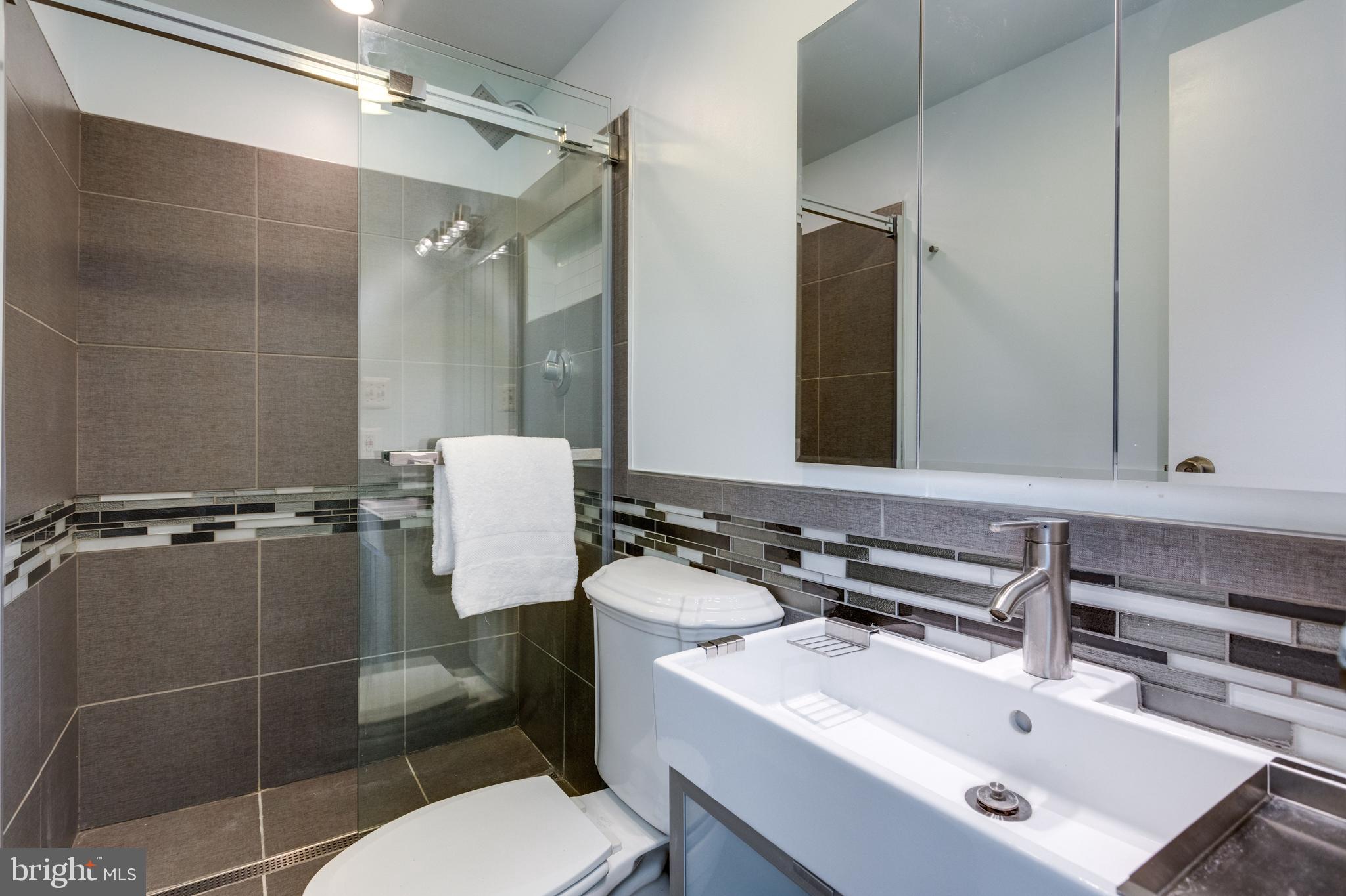 12204 Golden Sands Lane Reston, VA 20191 - Photo 21 of 48 Renovated Master bath with custom gray linen tile
