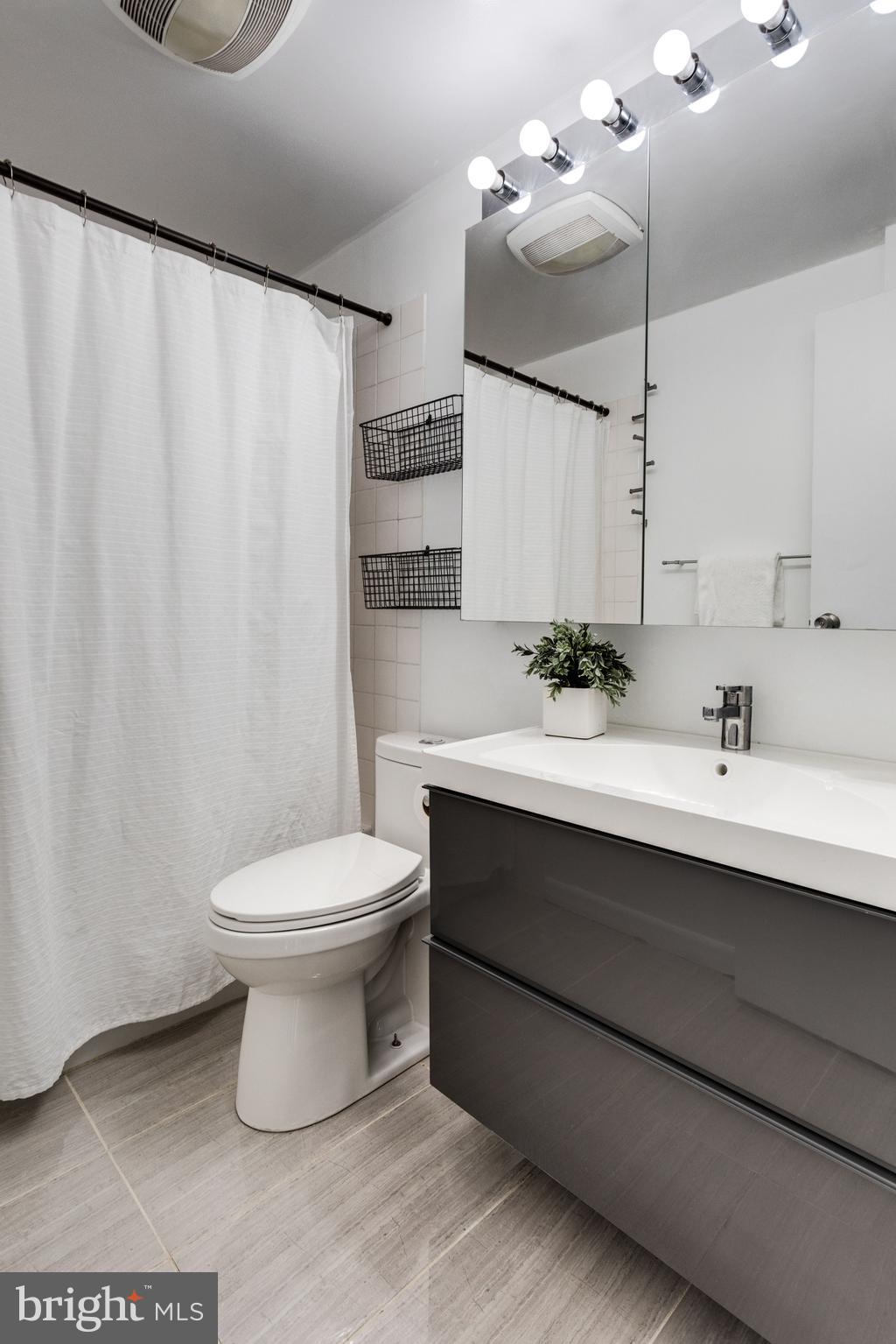 12204 Golden Sands Lane Reston, VA 20191 - Photo 26 of 48 Renovated Guest Bath