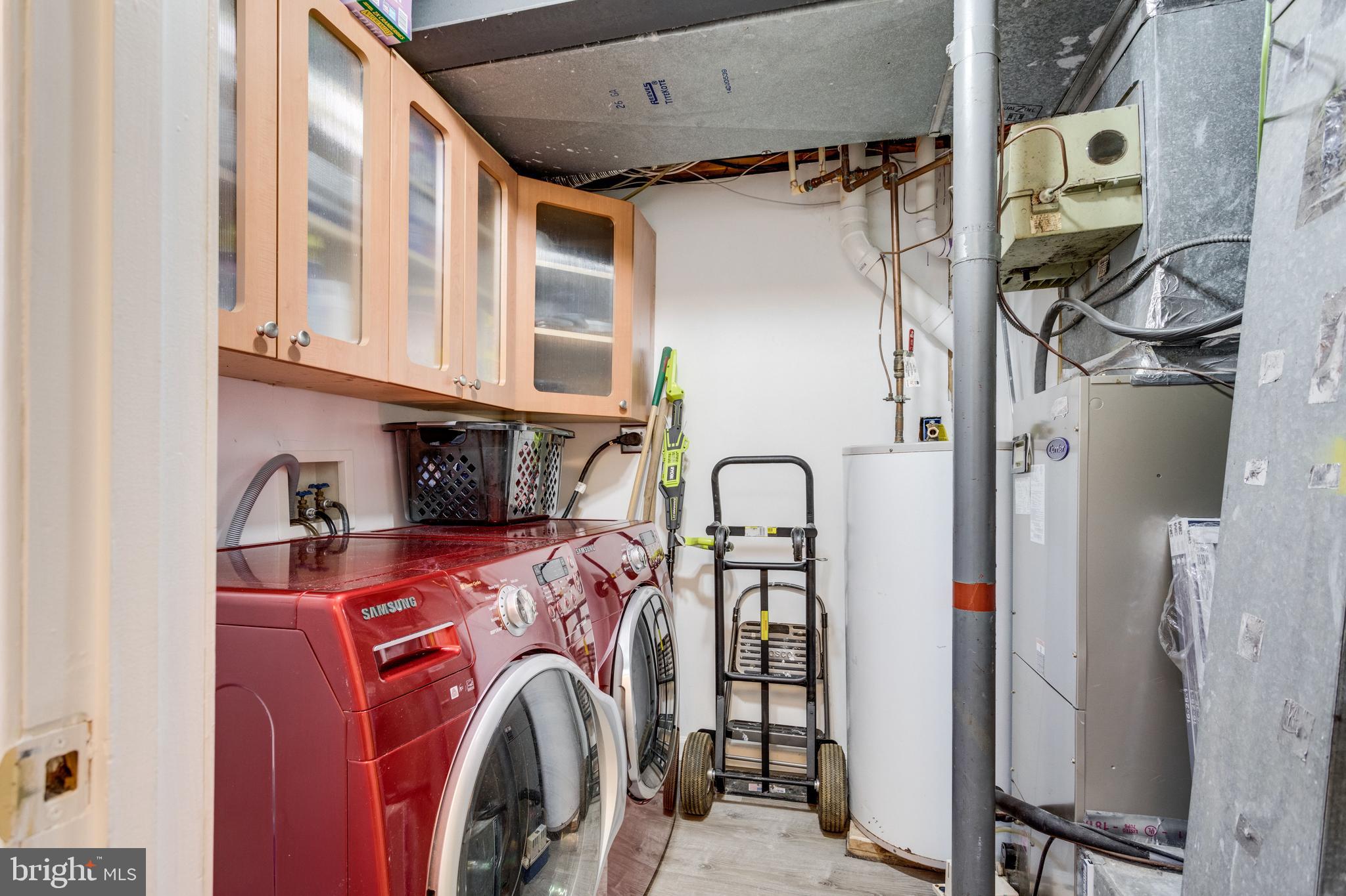 12204 Golden Sands Lane Reston, VA 20191 - Photo 34 of 48 Renovated laundry room with Front loading W/D
