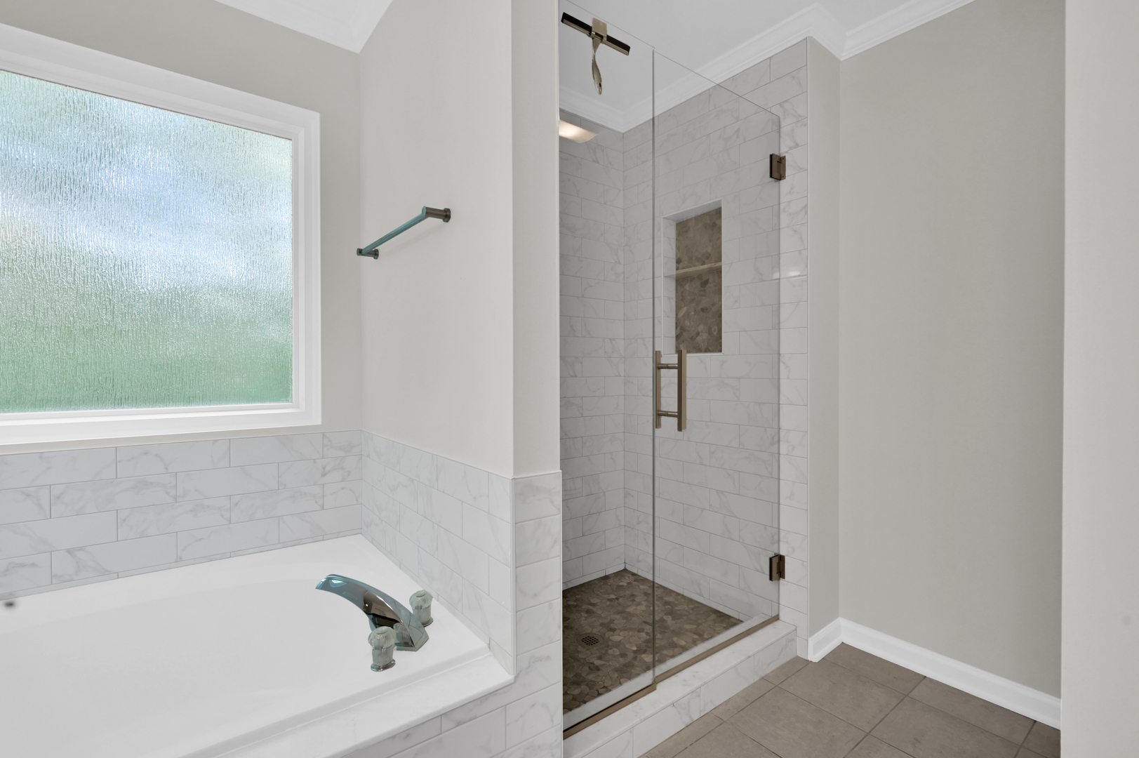 502 Windsor Circle Fox River Grove, IL 60021 - Photo 25 of 41 a bathroom with a tub and a window