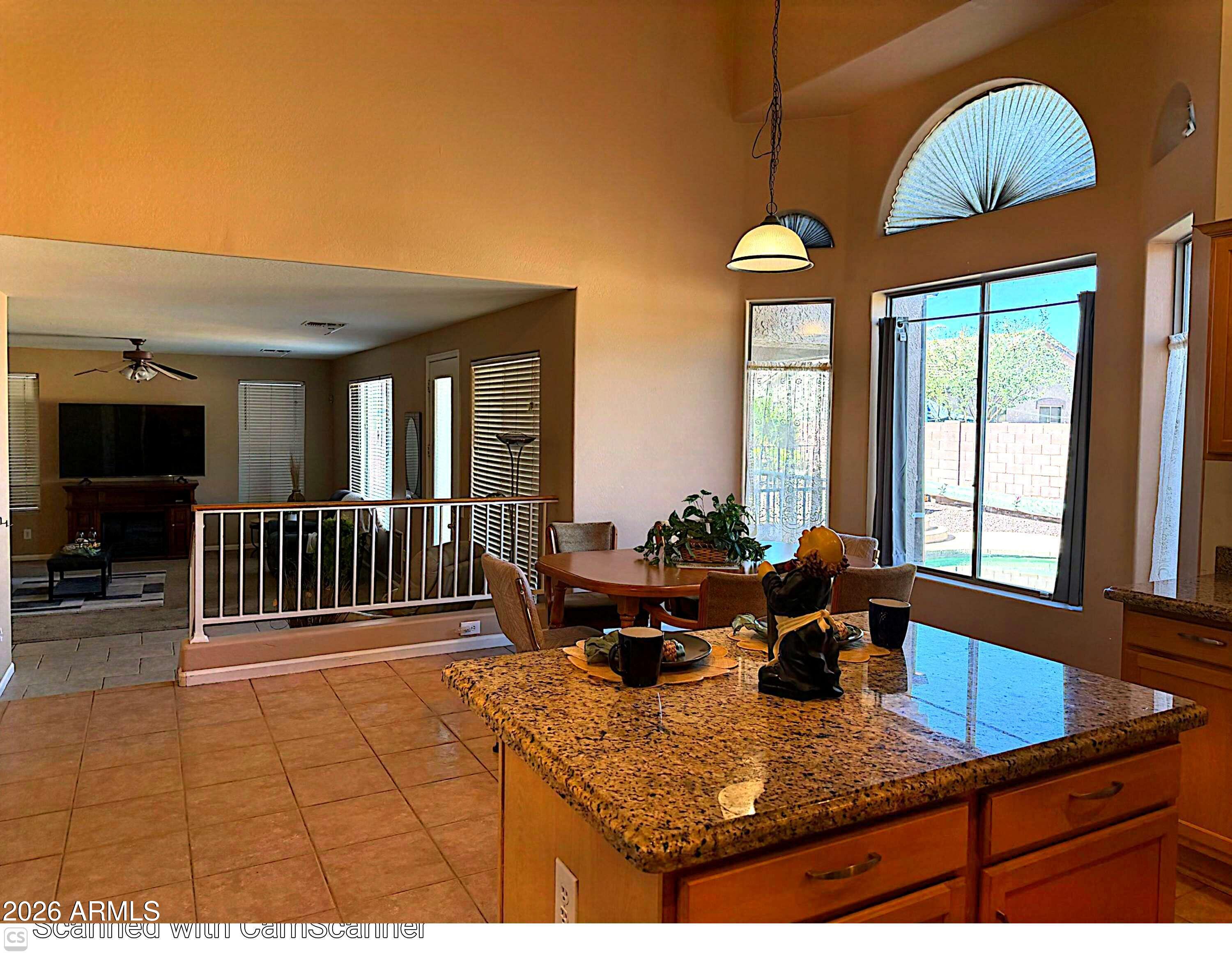 11058 East Cholla Road Mesa, AZ 85207 - Photo 5 of 22 a view of a living room and chandelier