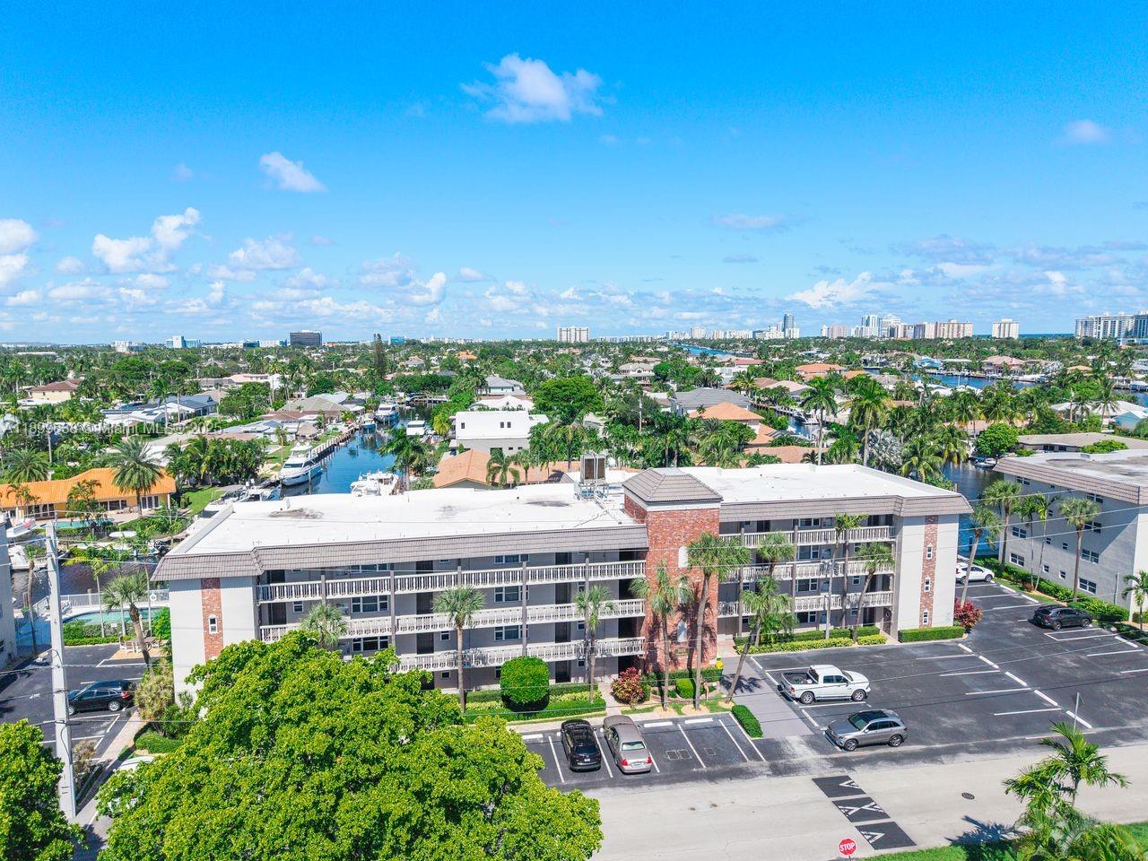 3111 Northeast 51st Street, Unit 202C Fort Lauderdale, FL 33308 - Photo 20 of 46 a view of a city that has tall buildings