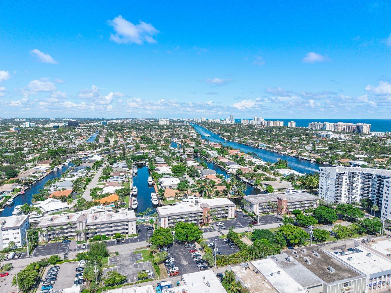 3111 Northeast 51st Street, Unit 202C Fort Lauderdale, FL 33308 - Photo 37 of 46 a view of a city with tall buildings