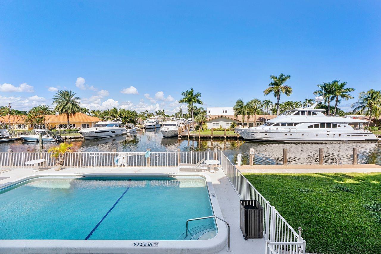 3111 Northeast 51st Street, Unit 202C Fort Lauderdale, FL 33308 - Photo 45 of 46 a view of a lake