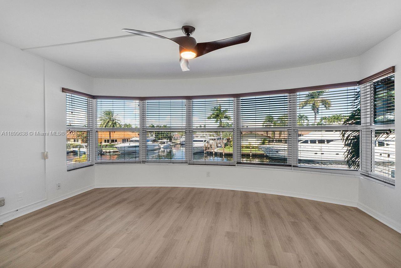3111 Northeast 51st Street, Unit 202C Fort Lauderdale, FL 33308 - Photo 10 of 46 a open hall with the view of kitchen and living room