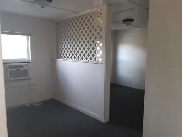 an empty room with windows