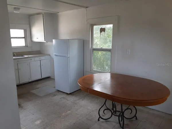 a view of table and chair in a room