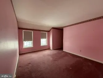 a view of empty room with window