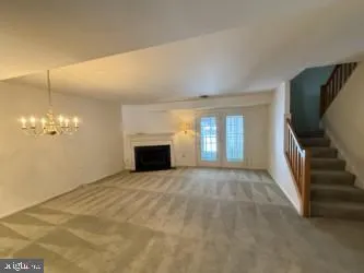 a view of a livingroom with a fireplace